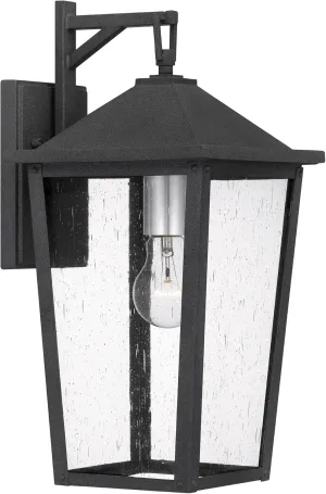 Quoizel Stoneleigh Outdoor Wall Lantern, Coastal Armour 16.5 Inch 1-Light Mottled Black Wall Sconce, Seeded Glass Exterior Wall Lantern Fixture, Outside Lights for Patio, Porch, Garage or Yard