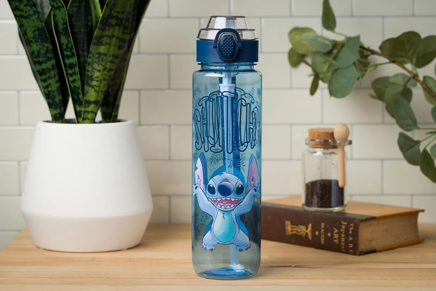 Silver Buffalo Disney Lilo and Stitch Plastic Water Bottle with Locking Lid, Strap, and Straw, 33 Ounces
