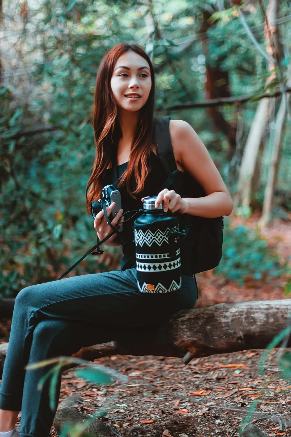 Water Bottle Holder w/Strap | Bottle Sleeve Carrier for Walking, Backpacking | Hydro and Iron Flask Sling Bag | Bottle Protector for Beer Water Coffee | Camping Accessories (64 oz, Obsidian Black)